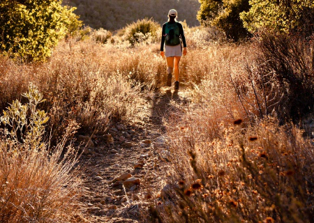 Barefoot hiking on a natural trail