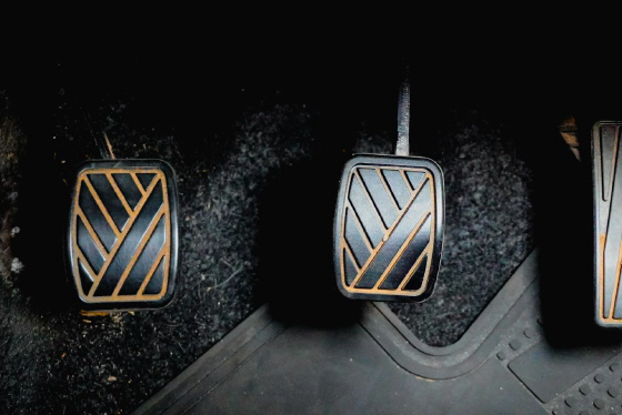 View of car pedals from the driver's seat